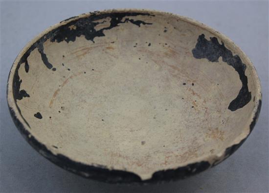 A Greek blackware pottery bowl, Apulia c.4th / 3rd century BC, 14.7cm